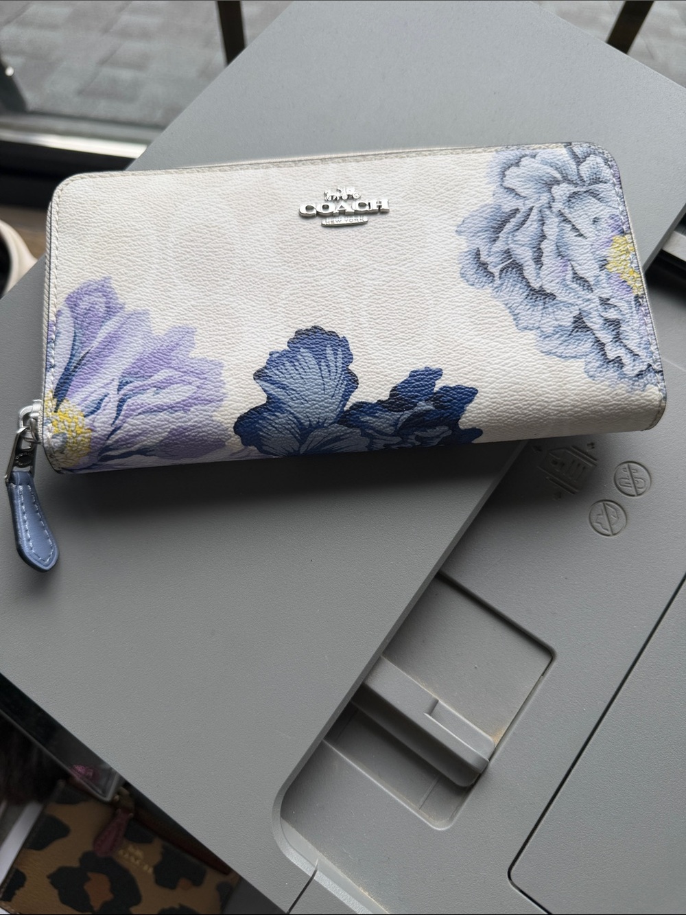 Coach long zip-around wallet in white signature canvas floral